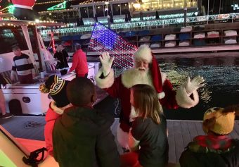 Three Olive Crest Families Ride Aboard Newport Beach’s Grand Marshall Yacht