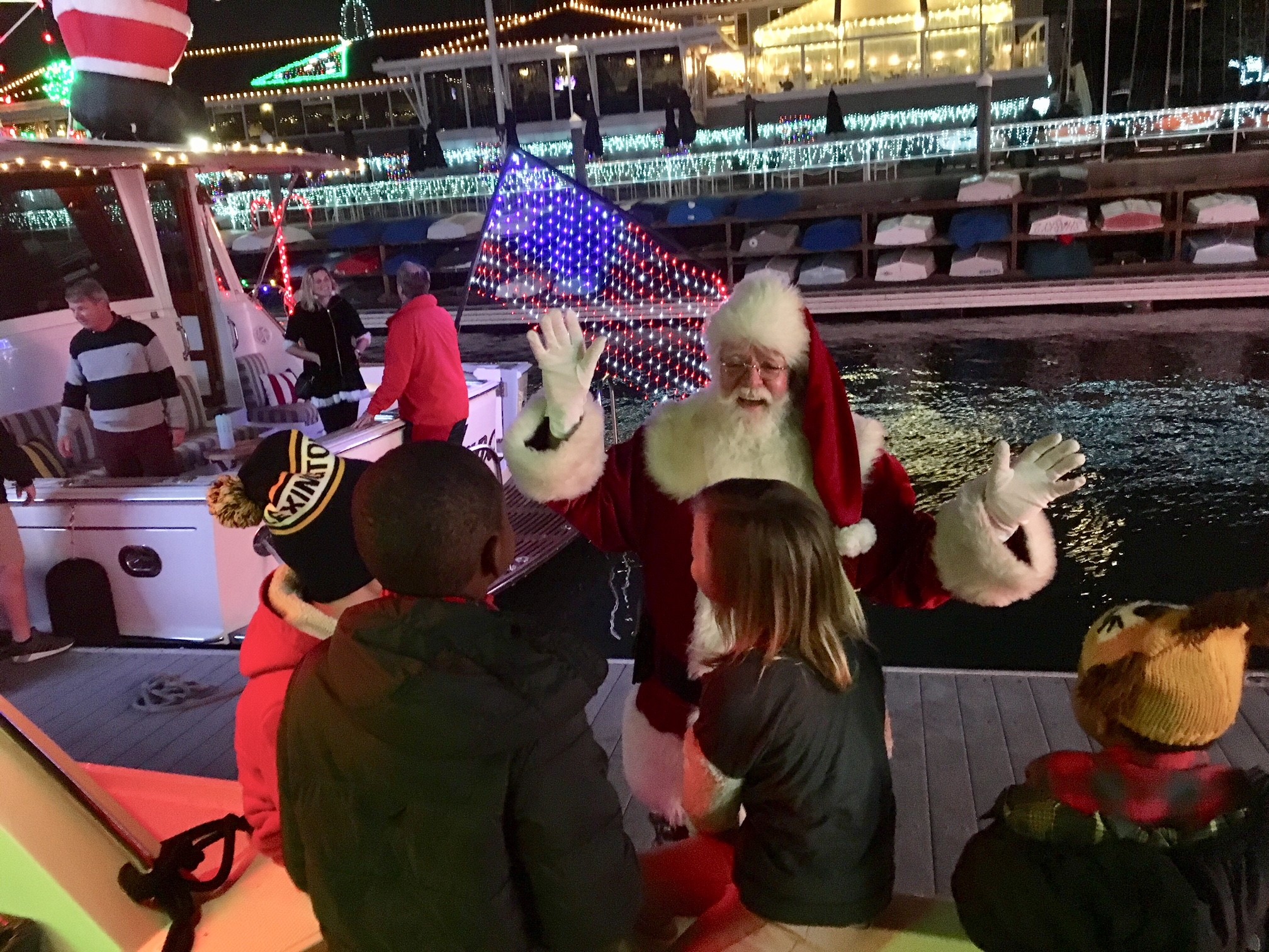 Three Olive Crest Families Ride Aboard Newport Beach’s Grand Marshall Yacht